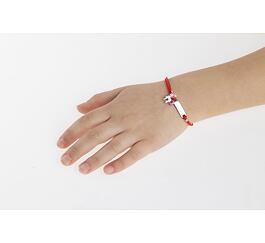 Bracciale in tessuto per bambini Frida rosso con una placca d'argento e un unicorno